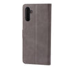 For Samsung Galaxy A56 5G Embossed Happy Cat Pattern Flip Leather Phone Case(Grey)