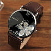 YAZOLE Ladies OL Style Four-leaf Clover Pattern Quartz Watch(338 black plate gold flower brown belt)