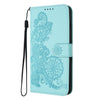 For Xiaomi Redmi K70 Datura Flower Embossed Flip Leather Phone Case(Light blue)