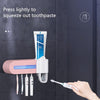 Smart Toothbrush Sterilizer UV Sterilization Electric Wall-mounted Toothbrushing Cup Rack(Pink)