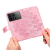 For Xiaomi Redmi K70 / K70 Pro 7-petal Flowers Embossing Leather Phone Case(Rose Gold)