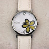 YAZOLE Ladies OL Style Four-leaf Clover Pattern Quartz Watch(338 white plate golden flower leucorrhea)