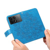 For Xiaomi Redmi K70 / K70 Pro 7-petal Flowers Embossing Leather Phone Case(Blue)