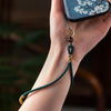Carved Auspicious Cloud Hand-woven Mobile phone Anti-lost Wrist Lanyard Key Pendant(Black)