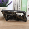 For Samsung Galaxy S24 FE 5G Camouflage Armor Kickstand TPU Hybrid PC Magnetic Phone Case(Army Green)