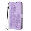 For Xiaomi Redmi K70 Datura Flower Embossed Flip Leather Phone Case(Purple)