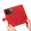 For Xiaomi Redmi K70 / K70 Pro 7-petal Flowers Embossing Leather Phone Case(Red)