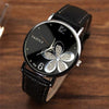 YAZOLE Ladies OL Style Four-leaf Clover Pattern Quartz Watch(338 black plate silver flower black belt)