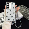 For Samsung Galaxy S24 FE 5G Little Fresh Bow Neck Chain TPU Phone Case(Black)