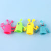 20 PCS Mini Finger Doll TPR Soft Rubber Monster Finger Cover Toys, Random Color and Style Delivery