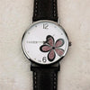 YAZOLE Ladies OL Style Four-leaf Clover Pattern Quartz Watch(338 white plate purple flower black belt)